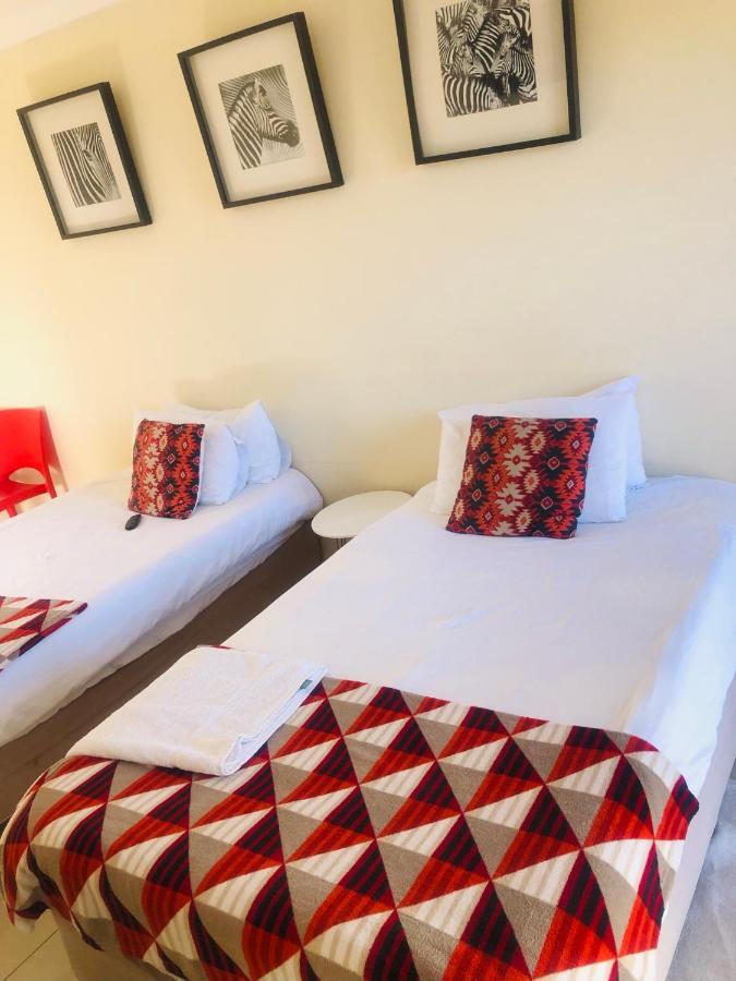 אוצ'יווארונגו Mo-Nize Villa Guesthouse מראה חיצוני תמונה